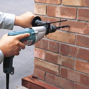 Ударная дрель Makita HP2051 — фото производителя